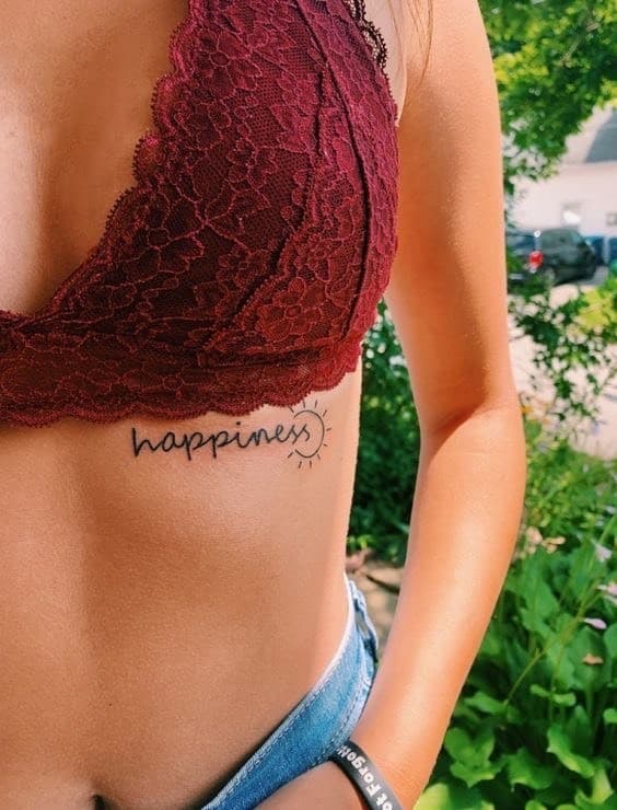 Fashion happiness and sun tattoo