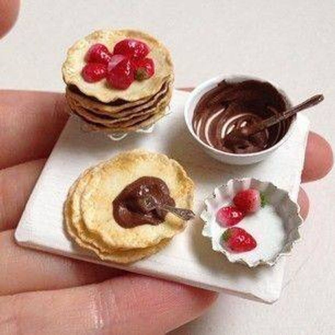 Fashion Pancakes with chocolate and strawberries