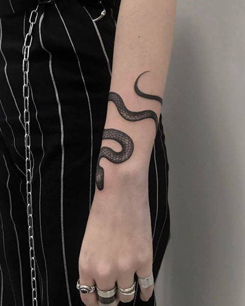 Moda Snake tattoo