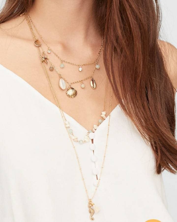 Producto Set de 4 collares STR de conchas