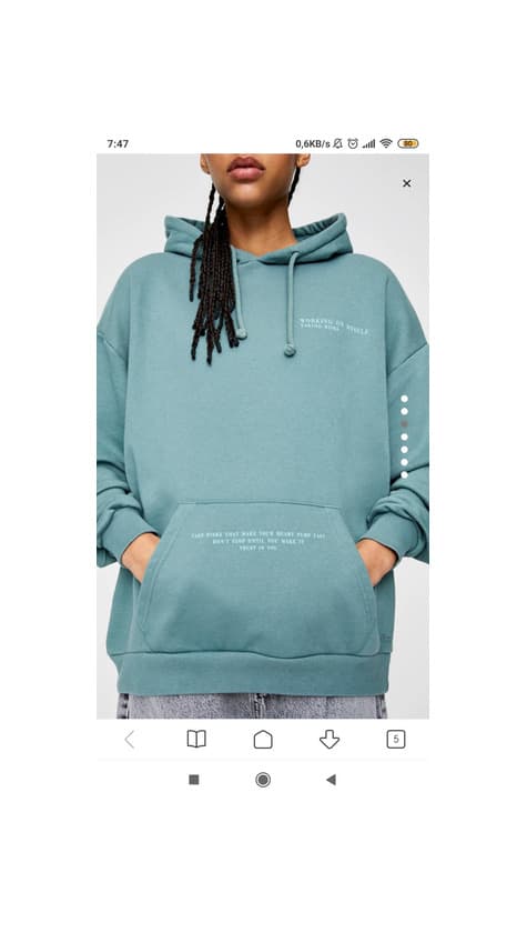 Product Green Sweatshirt with a message.