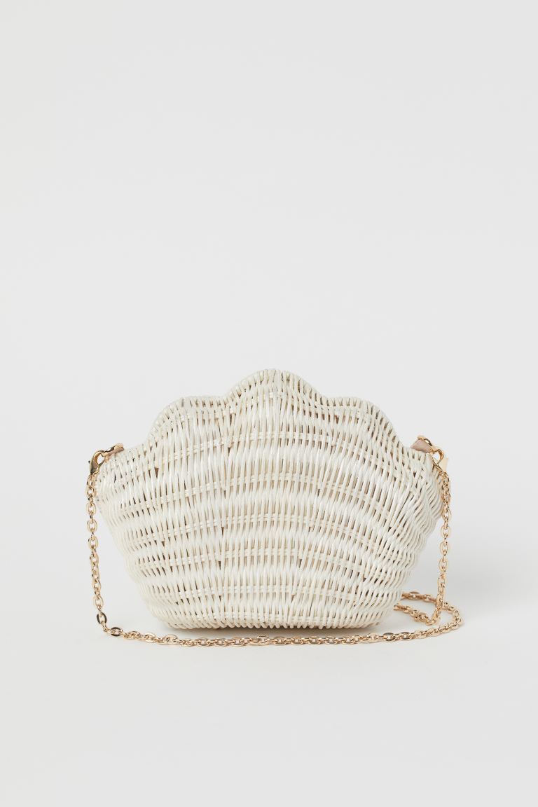 Product Clutch em forma de concha



