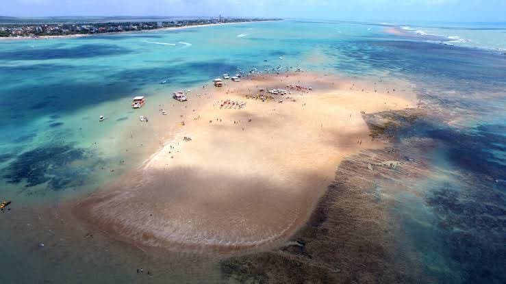 Moda Praia Areia vermelha. 