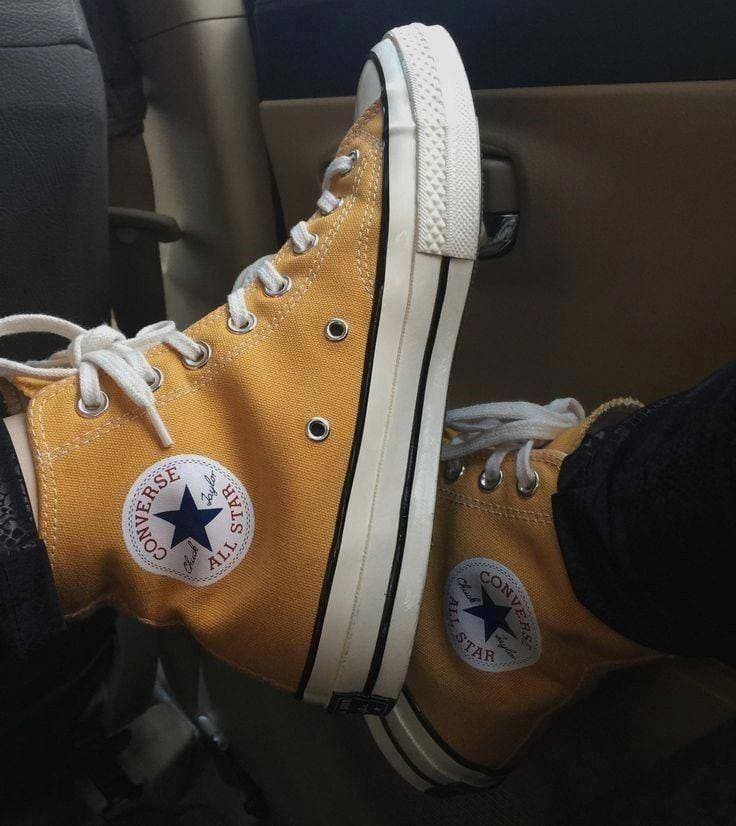 Producto yellow high top converse