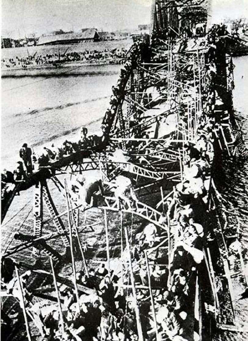 Moda Flight of Refugees Across Wrecked Bridge in Korea.