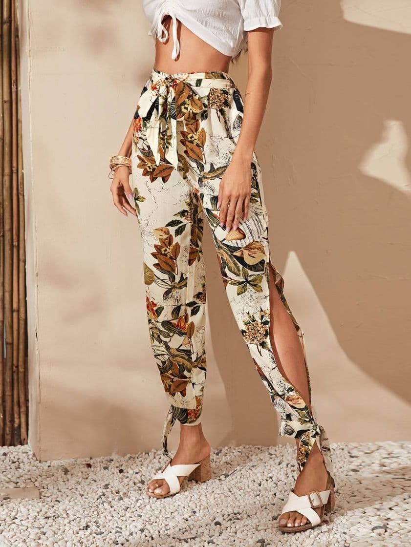 Moda Pantalones tropical con cinturón bajo con nudo y abertura